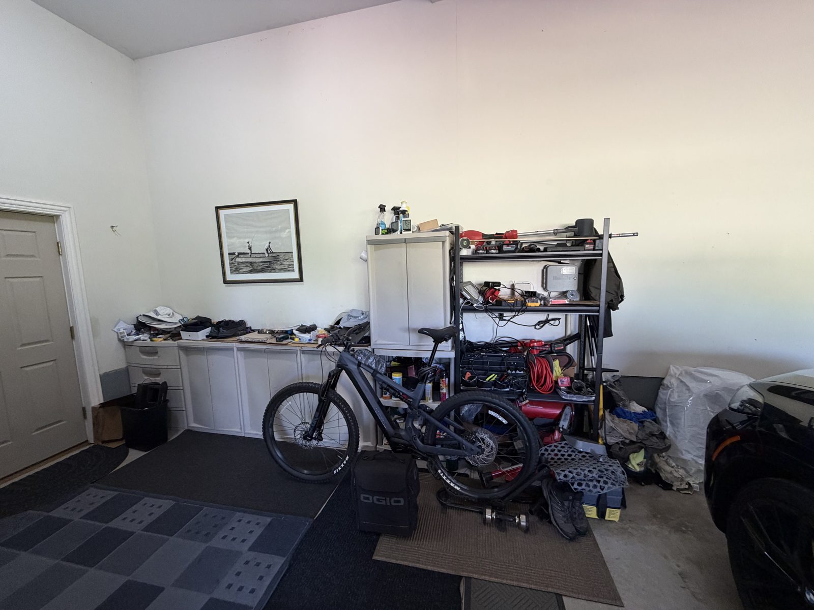 Before — bare concrete garage